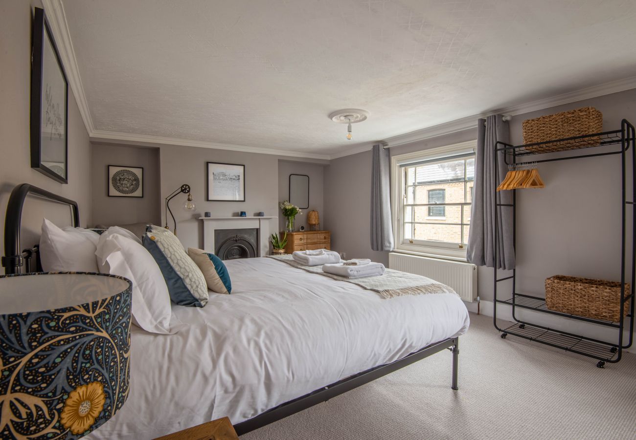 Principal bedroom viewed towards its sash window